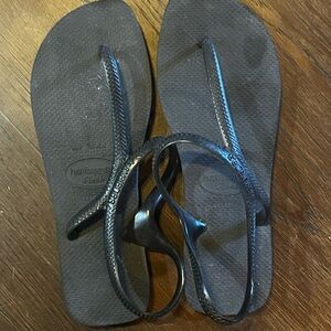 Black plastic sandals